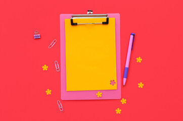 Composition with clipboard, blank sheet of paper and stationery on color background