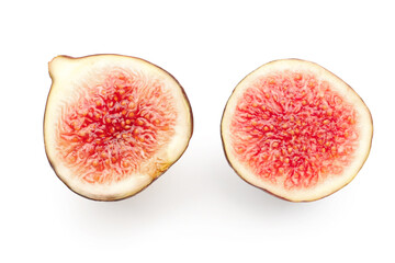 Halves of fresh ripe fig on white background