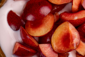 fresh yogurt with cherry flavor and whole juicy cherry berries