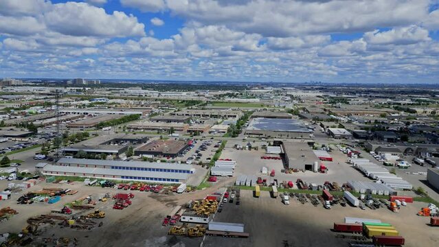 Explore Brampton Ontario urban industrial landscape in a 30s clip. Witness Urban Heat Island Effects and stark urbanization's impact on climate. Ideal for urban planning and climate education.
