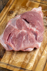 sliced piece of fresh raw pork during salting