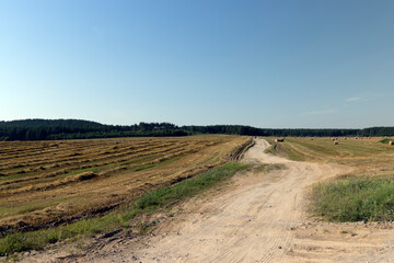 Obraz premium Rural road for cars and transport