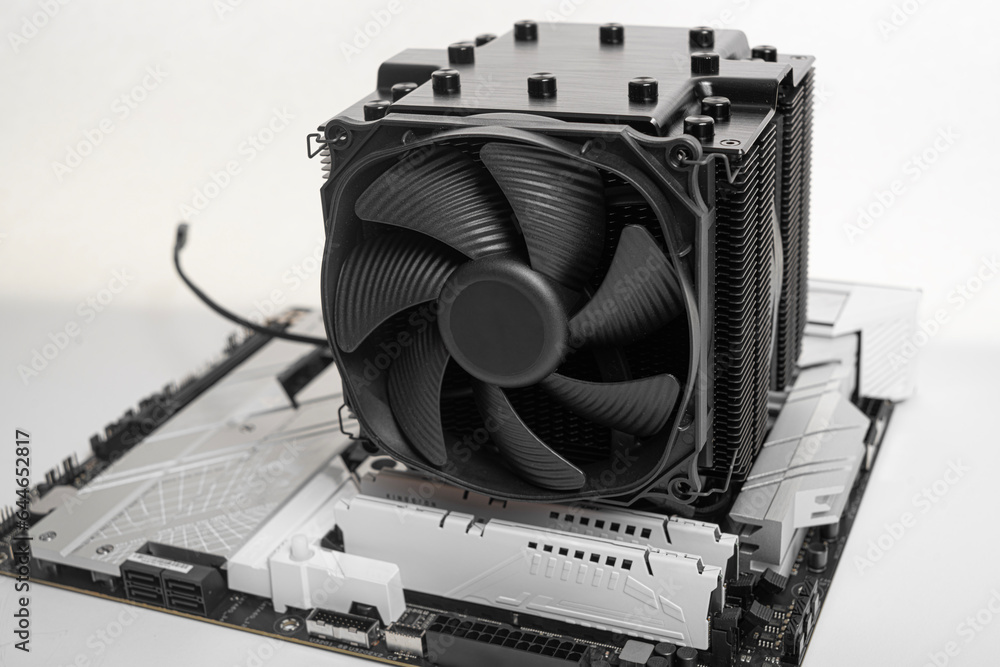 Poster installing a large air cooler on a computer processor.