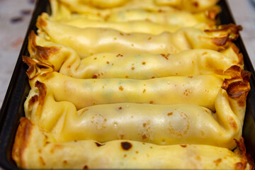 Traditional ricotta pancakes with spinach and cheese