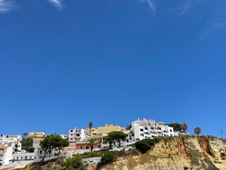 Fototapeta na wymiar View of Carvoeiro fishing village with beautiful beach, Algarve