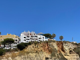 Obraz premium View of Carvoeiro fishing village with beautiful beach, Algarve