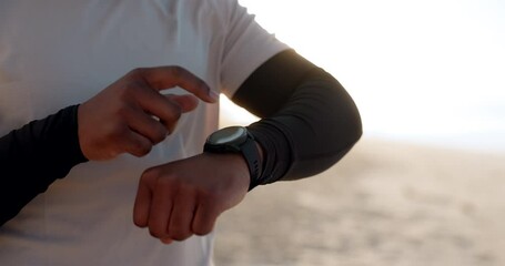 Outdoor, closeup and man with fitness, smart watch or check progress with exercise, wellness or lens flare. Person, runner or athlete with workout, hands or time with endurance, cardio or digital app - Powered by Adobe