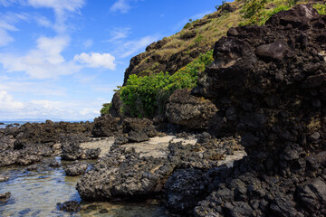green mountain above watery path fiji
