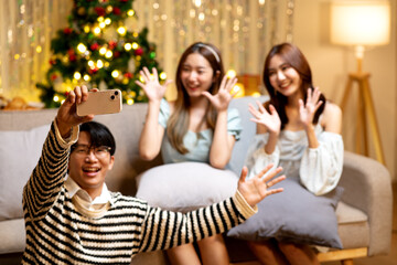 A group of friends selfie at a fun party to record memories and post pictures