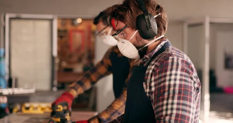 Carpenter, working and people with handyman, planning and tool with manufacturing and maintenance. Garage, craftsman and factory work for remodeling, carpentry or blacksmith project with shop worker