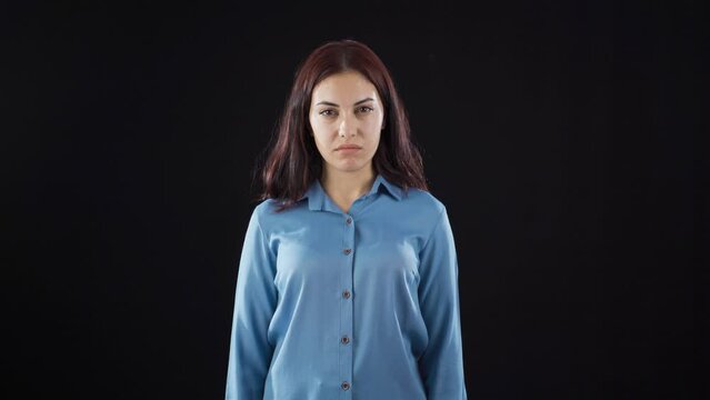 Woman looking accusingly at camera.