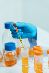 Close-up of laboratory technician conducting rigorous oil test, ensuring product integrity and safety, oil sample for quality control and purity testing, advancing petrochemical knowledge