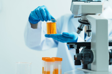 Fototapeta premium Close-up of laboratory technician conducting rigorous oil test, ensuring product integrity and safety, oil sample for quality control and purity testing, advancing petrochemical knowledge