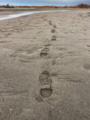 Foot prints on beach, Port Angeles, WA USA