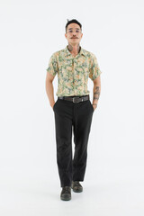 Fototapeta premium Portrait isolated cutout studio shot Asian vintage classic male fashion model with mustache neck arm tattoo wear glasses in casual classy outfit and leather boots standing on floor on white background