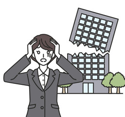 倒産して頭を抱えるスーツを着た女性