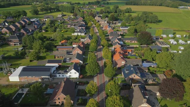 Lowering drone above traditional Dutch village of Gastel in Brabant province
