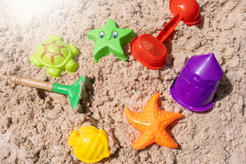 Fototapeta na wymiar toys on the sand