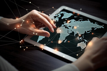 Close up of female hands using tablet pc with global network connection concept