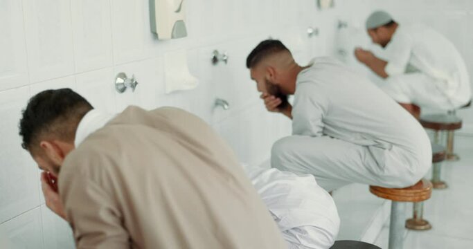 Muslim, wash routine and men before eid prayer in bathroom for purity, and cleaning ritual. Islamic, worship and faith of group of people with wudu together at a mosque or temple for holy practice