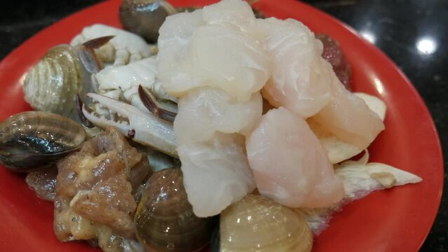 Seafood fish food in plate for hotpot recipe