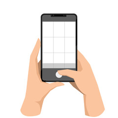 Hand holding phone, taking mobile photo. Making photograph with grid on smartphone screen. Using camera for shooting, recording video.