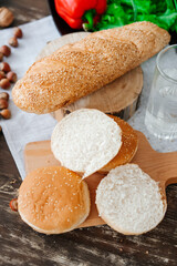 The concept of healthy eating, diet. Sesame bread on the table.