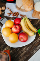 The concept of healthy eating, diet. Fruit. Bread. Apples, bananas, oranges.