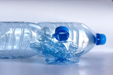 Recyclable plastic bottle: before and after crushing, plastic recycling