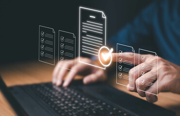 Businessman using laptop computer with correct sign mark and document icon for ISO or International...