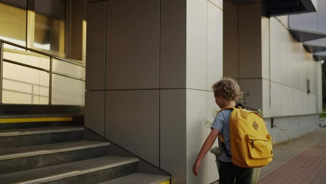 Little Boy Walking To School At First Day In New Class, Alone Caucasian Child With Backpack