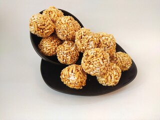 Kue Gipang, Jipang, also named Teng teng Beras one of Indonesian Traditional meal Cereal made from Rice Crispy with Sticky Sugar caramel. Taste Sweet and Crispy, on white background. photo image.