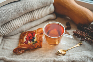 Cup of tea and sweet pastries, good morning concept