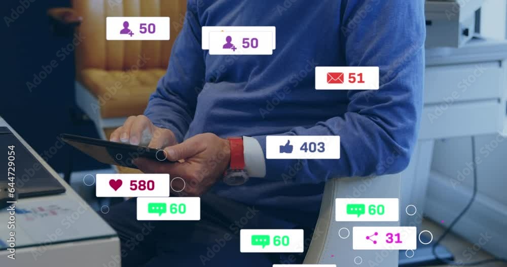 Poster animation of icons, numbers in notification bars, midsection of caucasian man using digital tablet
