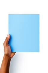 Obraz premium A human hand holding a blank sheet of blue paper or card isolated on white background