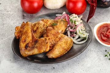 Grilled chicken wings with sauce