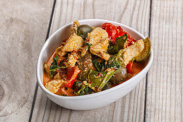 Thai red spicy curry with chicken