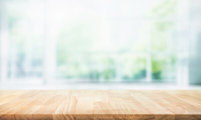 Selective focus.Empty of wood table top on blur of curtain with window and green from garden background.For montage product display or design key visual layout - obrazy, fototapety, plakaty