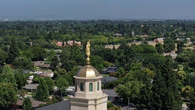 Aerial Feather River Yuba City California LDS temple spire close. Yuba City, California.  The Church of Jesus Christ of Latter-day Saints, Mormon church. Christian religion sacred building worship.