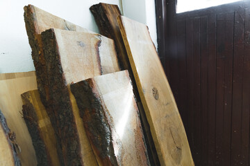 Set of wooden boards leaning against the wall. High quality photo
