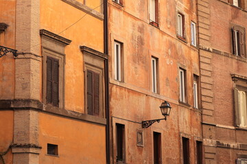 Typical Brown Building Facades with Lantern Close Up in Rome, Italy