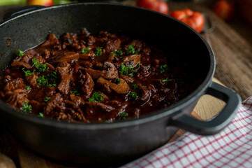 Braised poultry ragout with mushrooms and vegetables in a delicious brown sauce. Served ready to eat in a pot