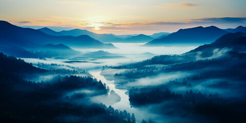 Fototapeta premium Aerial view of misty dawn in the mountains