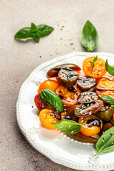 Tomato salad with basil, organic healthy products. Detox and clean diet concept. place for text, top view