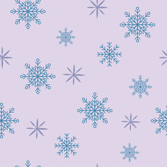 Fototapeta na wymiar Seamless pattern with blue and purple snowflakes on a purple background.