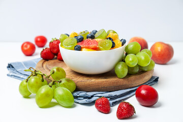 Tasty and healthy nutrition concept - fruit salad