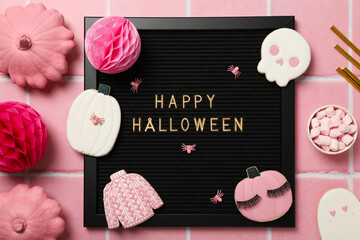 Black holiday card with cookies for Halloween