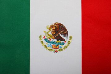 Mexico flag with coat of arms close-up.