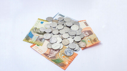 collection of Indonesian rupiah banknotes on a white background