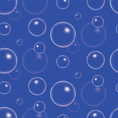 Seamless pattern of transparent bubbles on a blue background